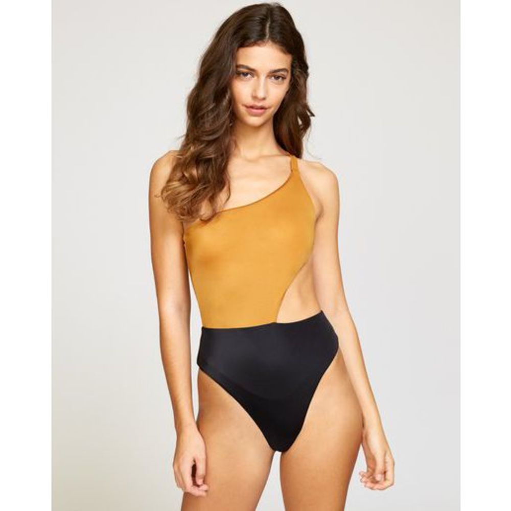 NWT RVCA BLACK AND GOLD SOLID CUT OUT CHEEKY ONE PIECE - size M